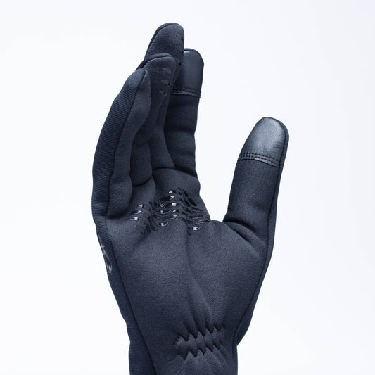 Outdoor Research Men's Backstop Sensor WindPro Gloves in Black being worn outdoors
