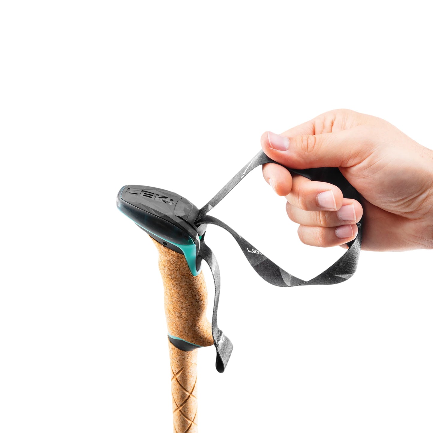 Hand adjusting the wrist strap on the Aergon Air Compact cork grip of the LEKI Cressida FX Carbon.