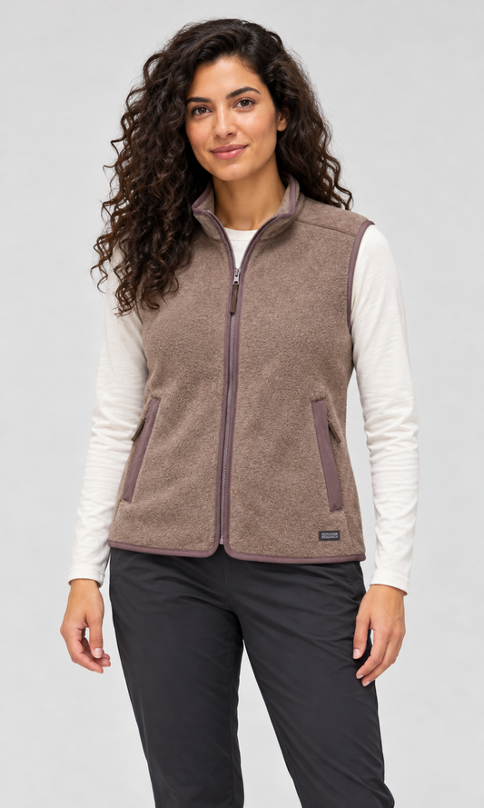 RBO model wearing Outdoor Research Women's Deming Fleece Vest in Sable