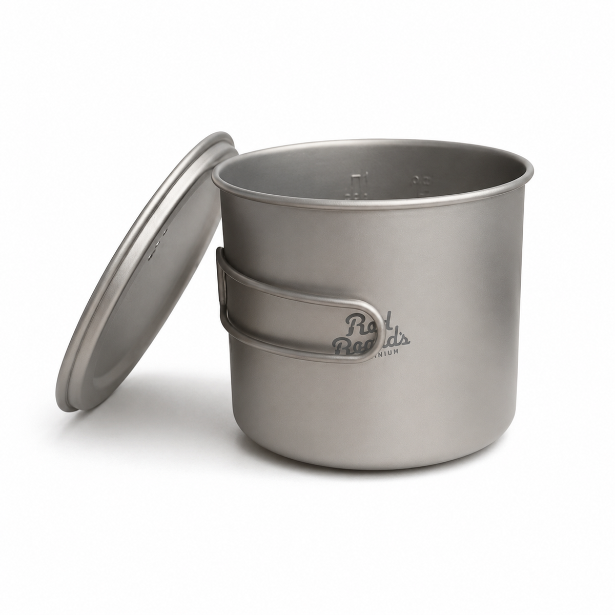 Close view of the 1.1 L titanium backpacking pot with lid and interior measurement markings