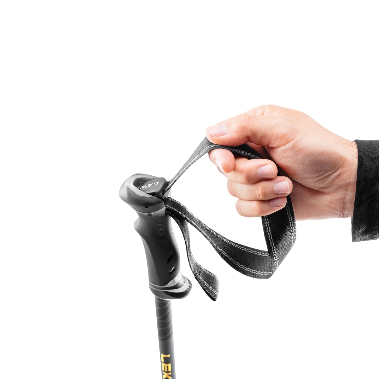 Hand adjusting the Lock Security Strap on LEKI Journey Lite trekking pole grip