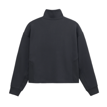 Back view of Grace Fairhope Boxy Quarter Zip in Black showing the stand collar, dropped shoulders and ribbed side panels