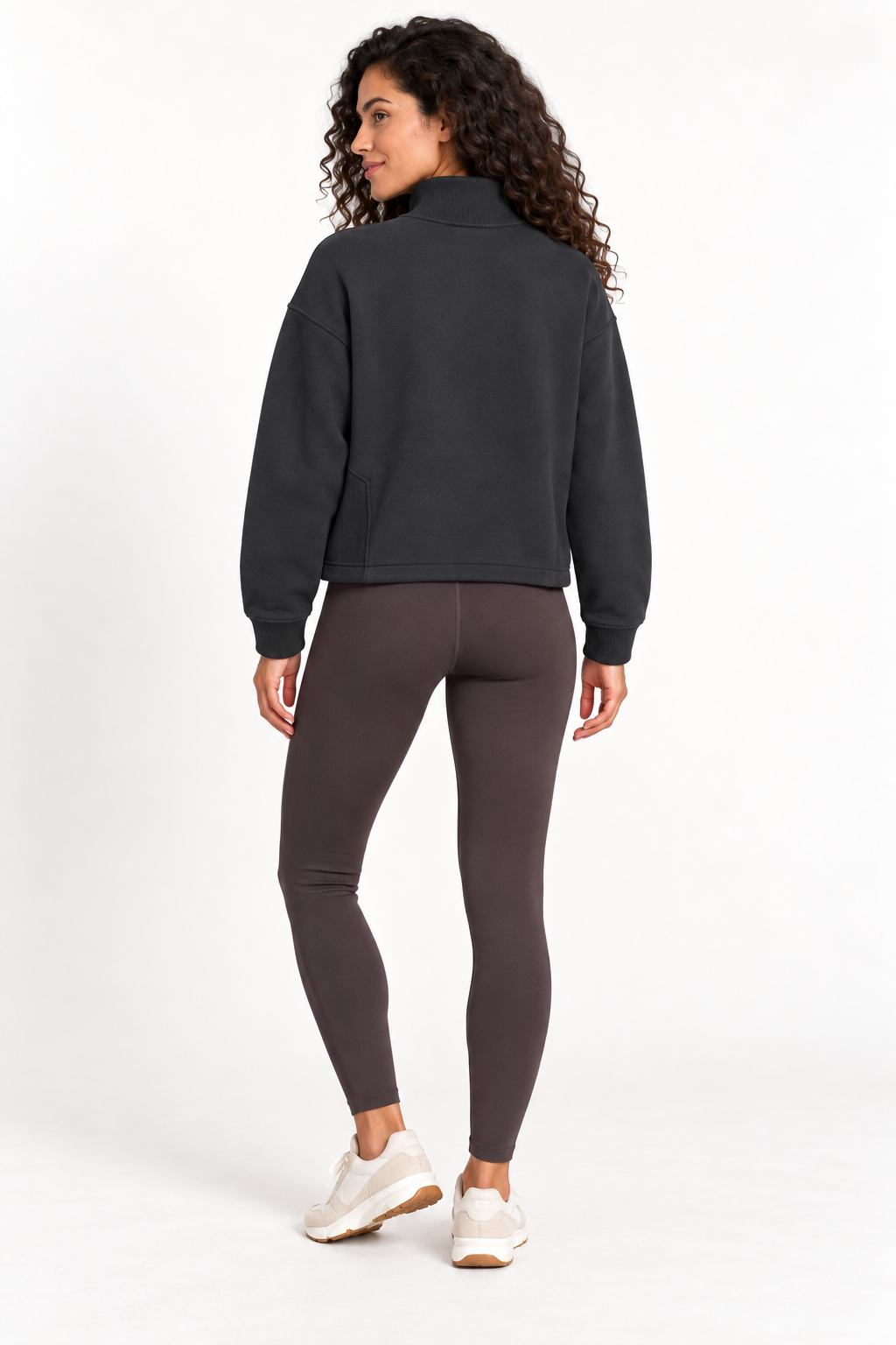 Back view of a model wearing the Grace Fairhope Boxy Quarter Zip in Black