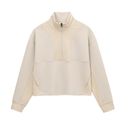 Front view of Grace Fairhope Boxy Quarter Zip in ivory showing ribbed collar, quarter zip and kangaroo pocket