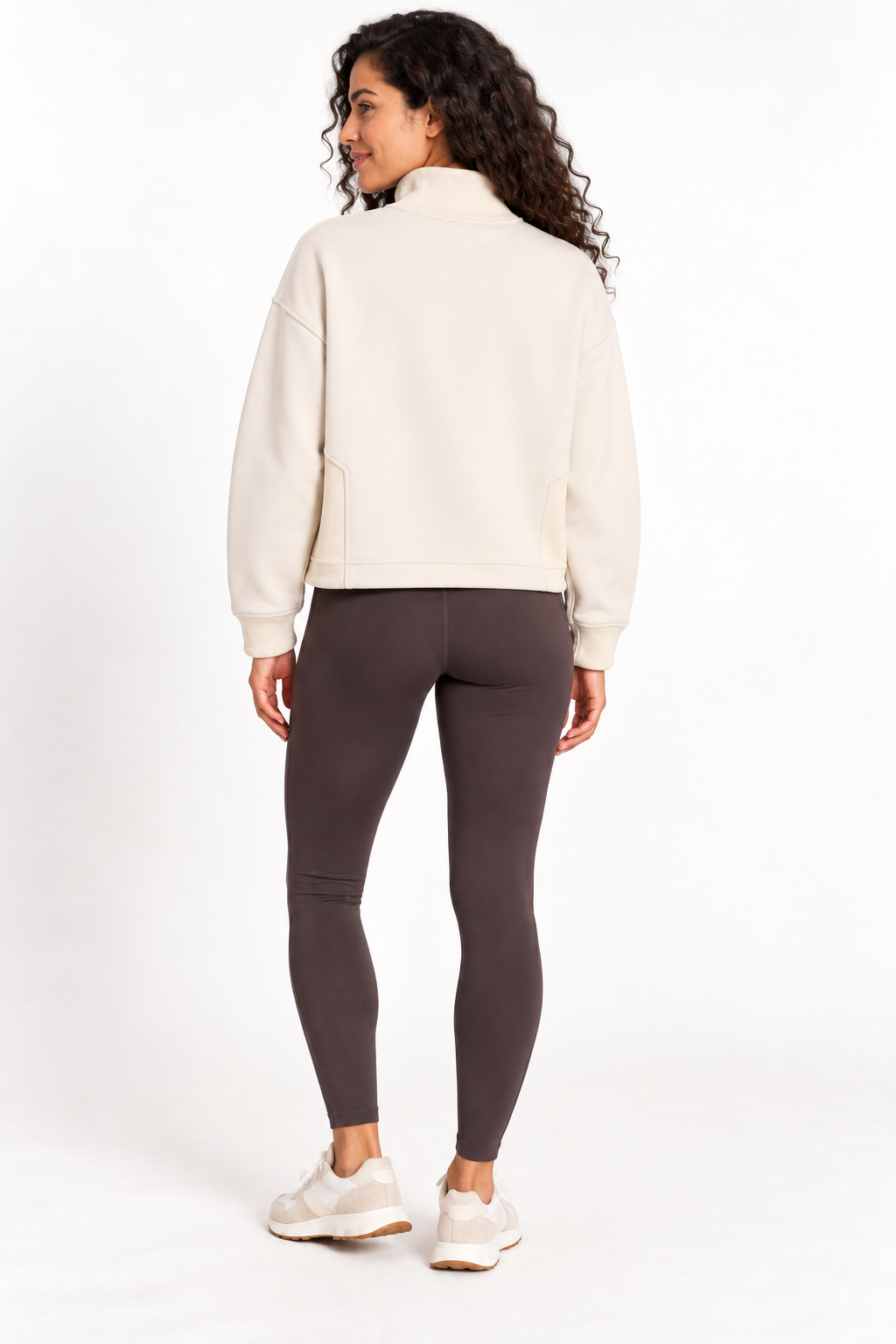 Back view of a model wearing the Grace Fairhope Boxy Quarter Zip in ivory