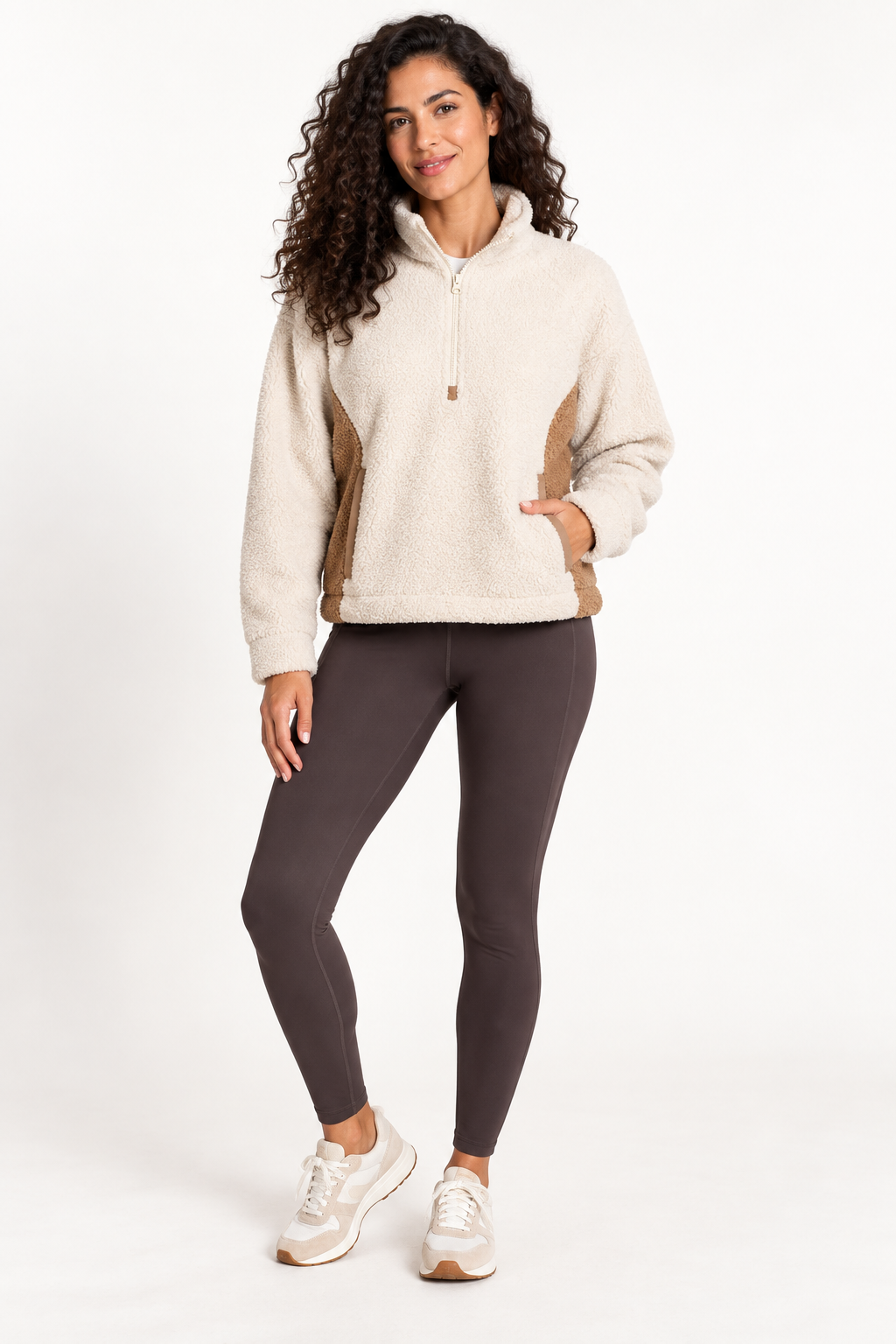 Woman wearing the Grace Point Clear Sherpa Boxy Pullover in Bone White, front view