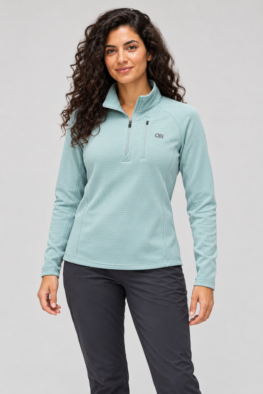 RBO model wearing Outdoor Research Women's Vigor Grid Fleece Quarter Zip in Thyme