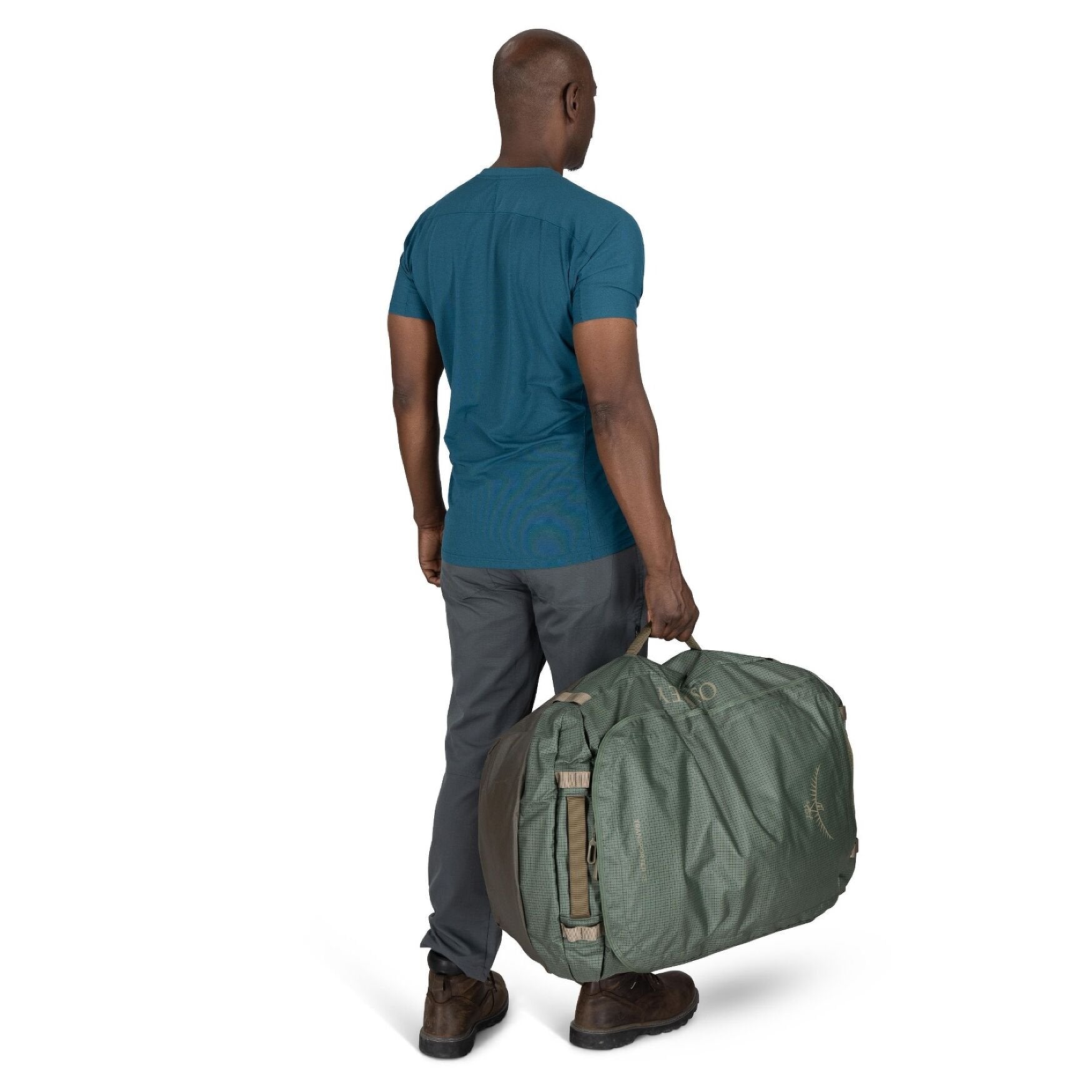Osprey Transporter Duffel 95 in Pine Leaf Earl Grey carried in hand by man.