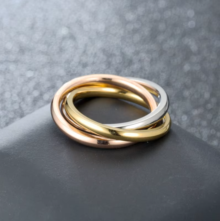 Willow + Wren Everly Interlocking Ring in mixed metal with silver, gold, and rose gold bands